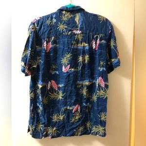 Men’s patriotic Hawaiian shirt with palm trees and surfboards